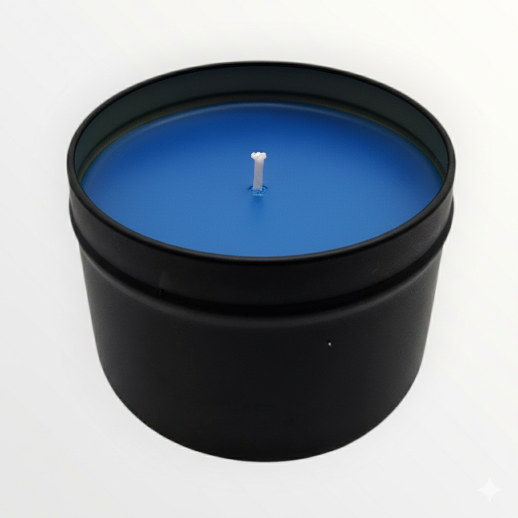 Blue candle in a black container on a white background