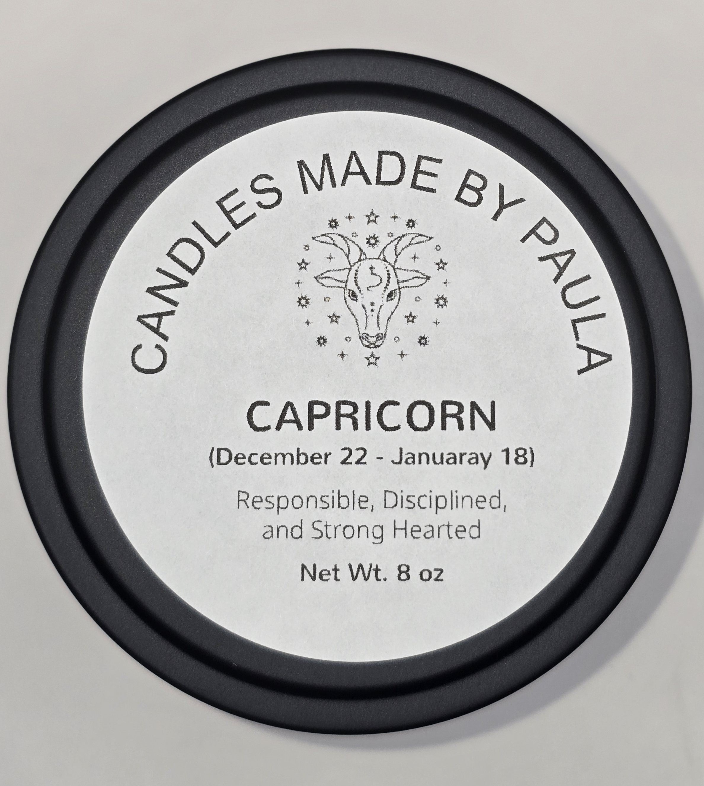 Capricorn zodiac candle in black - earth sign aromatherapy candle for December 22 to January 19