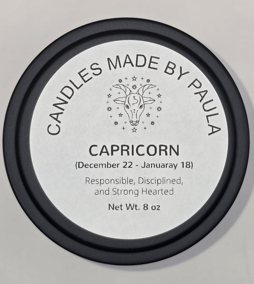 Capricorn zodiac candle in black - earth sign aromatherapy candle for December 22 to January 19