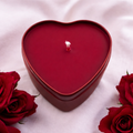 Red heart-shaped candles in tin set