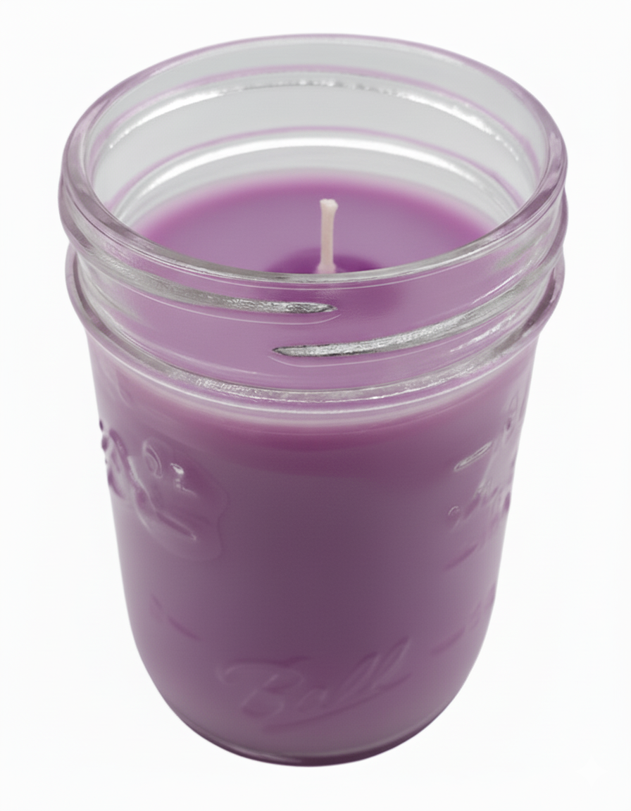 Purple citronella candle in a Ball jar on a white background