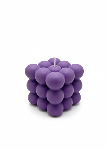 Handmade purple bubble candle with cube shape and smooth rounded spheres