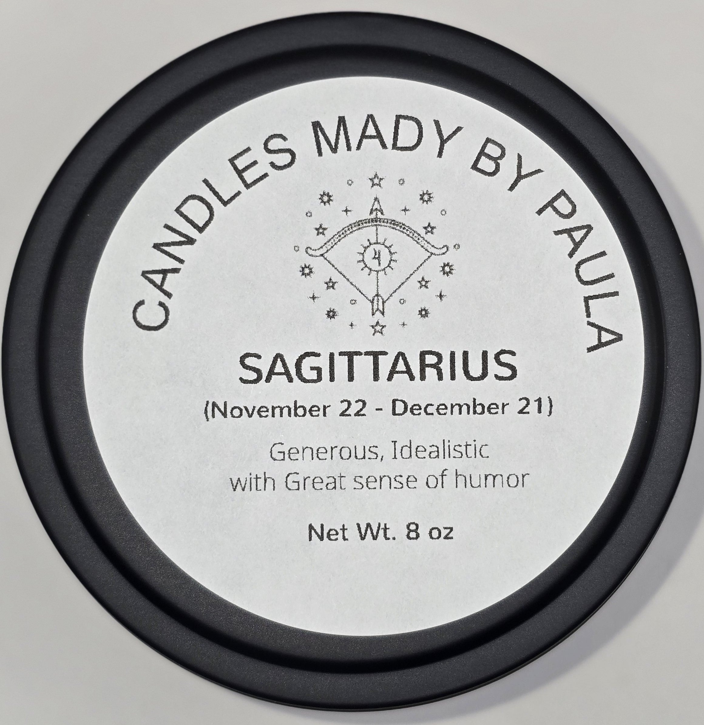 Sagittarius zodiac candle in purple - fire sign aromatherapy candle for November 22 to December 21