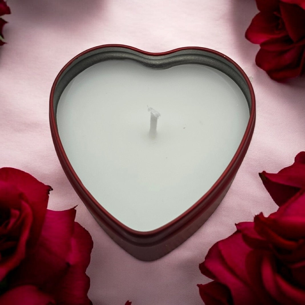 White heart-shaped candles in tin